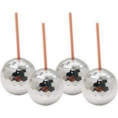 four silver balls with orange sticks in them