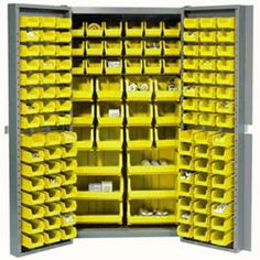 a large storage cabinet with yellow bins