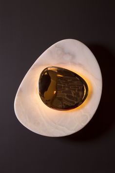 an egg shell is shown with the light shining in it's center and inside