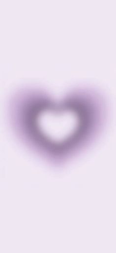 a blurry image of a heart shaped object on a purple and white background with space for text