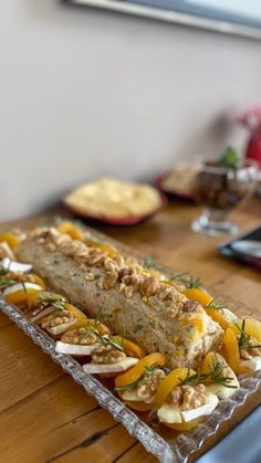 a tray with food on it sitting on top of a wooden table