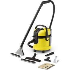 a yellow and black vacuum cleaner with tools