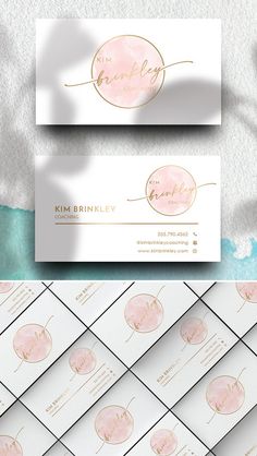 two business cards with gold foil and pink watercolors on them, one in the middle