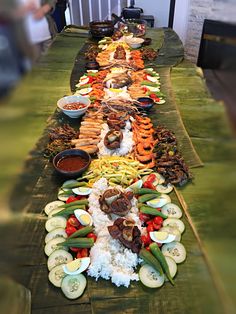 a long table filled with lots of food