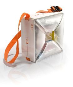 an orange and white camera strap attached to a clear box with its lid open on a white surface