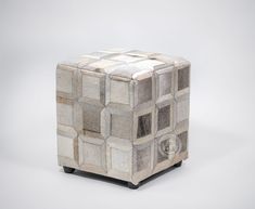 a cube shaped object made out of concrete blocks