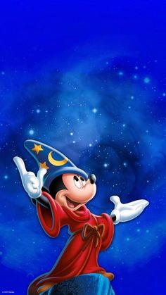 mickey mouse with a wizard's hat on top of his head and pointing at the stars