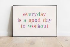 a framed poster with the words everyday is a good day to workout on it, against a white wall