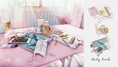 a pink table topped with assorted items next to a laptop and cell phone on top of it