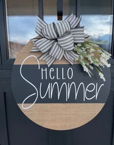 a door hanger that says hello summer with flowers on it and the words hello summer written in white