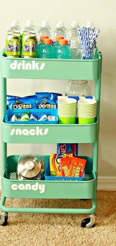 a cart with drinks, snacks and candy on it