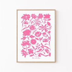 a pink flower print on a white wall