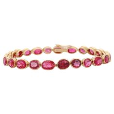 Ruby bracelet in 18K Gold. It has a perfect oval cut gemstone to make you stand out on any occasion or an event. A tennis bracelet is an essential piece of jewelry when it comes to your wedding day. The sleek and elegant style complements the attire beautifully, whether it's the bride wearing it herself, or as a gift to her bridesmaids to wear on the D’day. PRODUCT DETAILS :- > Material - 18K Solid Yellow Gold > Gemstone - Ruby > Stone Weight - 22.8 ct > Stone Shape - Oval > Stone Pcs - 24 > Stone Size - 6 x 4 mm > Gross Weight - 15.33 Grams > Setting - Bezel setting We can customize the Gold Gemstone Bracelet according to your specification. Go to our Storefront Page for more updates and click on the follow button to never miss out on our newly added jewelry collection. All our jewelry pr Wedding Gif, Bracelet Tennis, Ruby Bracelet, Pink Ruby, Mother Daughter Gifts, Ruby Stone, Birthstone Bracelets, July Birthstone, Pink Bracelet