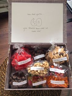 an open box filled with lots of different types of nuts and vegetables next to a note that says, you should never let go