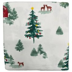 a white sheet with christmas trees and deers on it