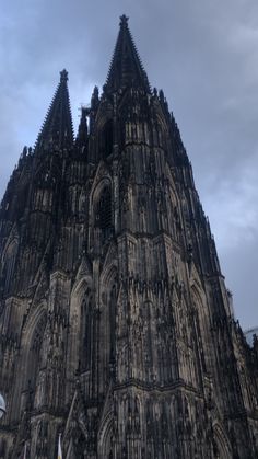 the large cathedral has many spires on it's sides