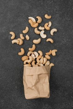 a bag full of cashews sitting on the ground