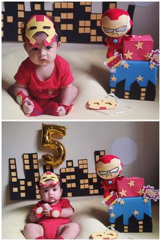 a baby is sitting in front of some decorations