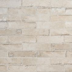 a white brick wall with no mortars on it