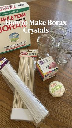 the supplies needed to make borax crystals are displayed on a wooden table