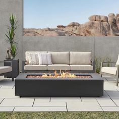 a fire pit sitting on top of a patio