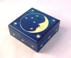 a blue box with a crescent and stars painted on it