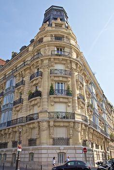 a large building with many balconies on it