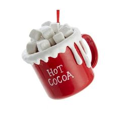 hot cocoa mug ornament with marshmallows in it on a white background