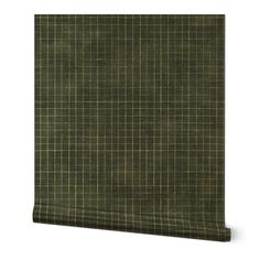 a green and yellow plaid wallpaper with horizontal lines on the bottom half of it