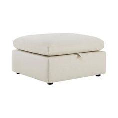 a white ottoman with black legs