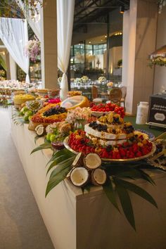 a buffet table filled with lots of different types of food