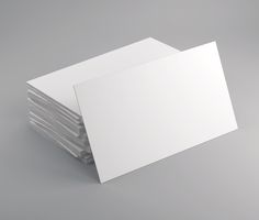 stack of white business cards on grey background with clipping area for text or image