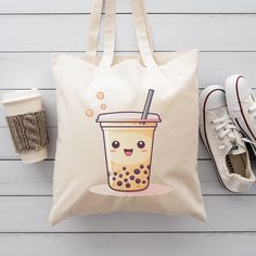 Boba Tea Library Book Bag, Cotton Canvas Tote Bag, Trendy Teen Gifts, Cute Boho Bag, Kawaii Tote Bag  This 100% cotton bag comes in one size - 15" x 16"- perfect for everyday wear. While the canvas material will show off your designs in great colors, it's durable and will last for years. The bag features 20" handles (made from the same canvas), making it easy to carry even with a week's worth of shopping. .: 100% cotton canvas .: Heavy fabric (12 oz/yd² (406.9 g/m .: Sewn-in label WE DO NOT ACCEPT EXCHANGES, RETURNS OR CANCELLATIONS We add our size chart as a reference, so please make sure that you are selecting carefully. Once an order is received it goes into production and we are unable to cancel orders. Kawaii Beige Bags Perfect For Gifts, Kawaii Beige Bag As Gift, Kawaii Beige Bag For Gift, Kawaii Beige Pouch Bag, Kawaii Rectangular Gift Bag, Handmade Kawaii Bags For Daily Use, White Kawaii Canvas Bag As Gift, Kawaii Rectangular Canvas Bag Gift, Kawaii Tote Bag For Gift