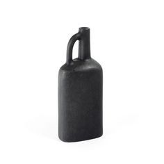 a black jug is shown on a white background