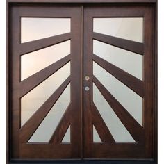 a close up of a wooden door with glass inserts on the top and bottom