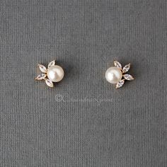 An off-white pearl sits next to four leaf CZ jewels in these pretty stud earrings for the bride. The earring measurements are .75 inches long and 3/8 inches wide, rhodium, rose gold, or gold plated, AAA CZ, lead, and nickel free. Second Stud Earrings, Second Stud, Small Earrings Gold, Earrings Bride, Gold Earrings Models, Fashion Terms, Ear Ring, Aesthetic Jewelry, Bride Jewelry