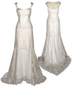 two white wedding gowns are on display