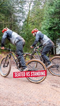 two men riding bikes in the woods with a sign that says seated vs standing on it