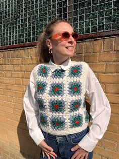 Expertly handmade with granny square patterns, these knit warm vests are the perfect addition to any wardrobe. These unique cardigans are not only a statement piece, but also a thoughtful and one-of-a-kind gift.  M A T E R I A L: - Cotton yarn, Acrylic yarn - Hand-knitted - 100% Handmade S I Z I N G: Fits to EU36-40, UK8-14, US2-7 It can be customised depending on your measurements/size. If you are unsure about the size or want to customise the size, please message me before your purchase. M O D Gilet Granny Square, Handmade Casual Vest, Crochet Granny Square Sweater Vest, Crochet Granny Square Cardigan Pattern, Granny Square Sweater Vest, Granny Square Top Crochet, Granny Square Pullover, Crochet Granny Square Sweater, Vest Patchwork