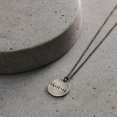 This stylish Men's Personalised Necklace features a sterling silver disc suspended from a silver chain. Each disc pendant can be personalised with up to 8 characters. Made from solid sterling silver by our expert jewellers and finished with a unique oxidised finish. This is the perfect gift for him. Silver Hand Stamped Necklace For Birthday Gift, Silver Oval Pendant Necklace For Birthday, Classic Silver Hand Stamped Necklace, Minimalist Sterling Silver Necklace For Father's Day, Modern Necklace For Father's Day Gift, Modern Round Disc Necklace For Gifts, Modern Round Disc Necklace As A Gift, Hand Stamped Sterling Silver Necklaces For Father's Day, Father's Day Silver Round Pendant Jewelry