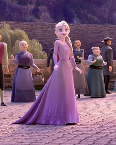 the frozen princess is standing in front of other people