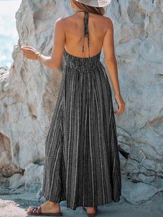 This Cabo Holiday Printed Backless Maxi Dress is perfect for any special occasion. It boasts a grey printed pattern and features an open backless design for a stylish and feminine look. Made of high-quality fabric, the dress is comfortable, breathable, and durable. Get ready to turn heads! Rayon/CottonPull On ClosureDry Clean Only Size ChartXS = Dress 0-2, Bust, 31"-32.5", Waist 23"-24Small = Dress 4-6, Bust,33"-35", Waist 25-26", Hips 35"-37"Medium = Dress 8-10, Bust 35-36" Waist 27-28", Hips 3 Elegant Beach Halter Dress With Smocked Back, Backless Sundress With Smocked Back, Sundress With Smocked Back Maxi Length, Sundress Style Backless Maxi Dress With Smocked Back, Bohemian Party Dress With Smocked Back, Vacation Backless Maxi Dress With Smocked Back, Elegant Backless Dress With Smocked Back For Vacation, Elegant Backless Dress With Smocked Back For Beach, Bohemian Backless Maxi Dress With Smocked Back