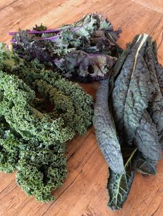 several different types of vegetables on a wooden surface