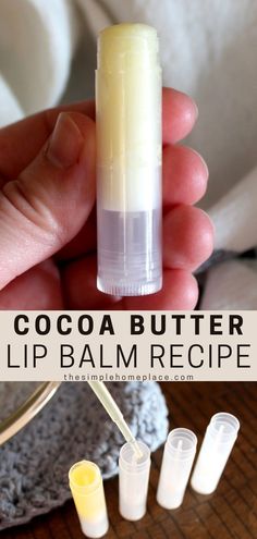 hand holding tube of homemade cocoa butter lip balm Lip Balm With Cocoa Butter, Lip Balm With Almond Oil, Homemade Organic Lip Balm, Cocoa Butter Lip Balm Recipe, Cocoa Butter Lip Balm Diy, Best Lip Balm Recipe, Coco Butter Lip Balm, Cocoa Lip Balm, Creamy Lip Balm Recipe