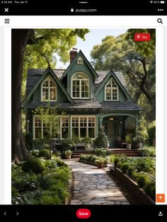 an image of a green house in the middle of trees and bushes with red lettering on it