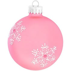 a pink ornament with white snowflakes on it