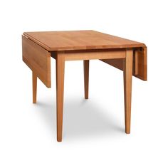 a small wooden table with one drawer open