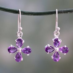 Four petals form a radiant blossom in these pretty earrings from India's Chintan. Amethysts that total 1.5 carats are set in polished sterling silver. .925 Sterling silver Cheap Purple Flower Earrings, Elegant Lavender Sterling Silver Earrings, Elegant Purple Sterling Silver Flower Earrings, Elegant Lavender Flower Shaped Jewelry, Purple Sterling Silver Flower-shaped Jewelry, Silver Flower Gemstone Earrings, Hypoallergenic Sterling Silver Teardrop Flower Earrings, Hypoallergenic Teardrop Flower Earrings In Sterling Silver, Hypoallergenic Lavender Sterling Silver Earrings