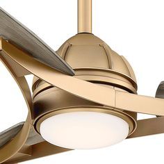 a gold ceiling fan with a light on it's side and two blades in the middle