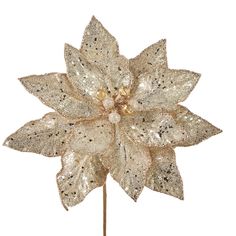 a gold and white flower on a stick with sequins in the center, isolated against a white background